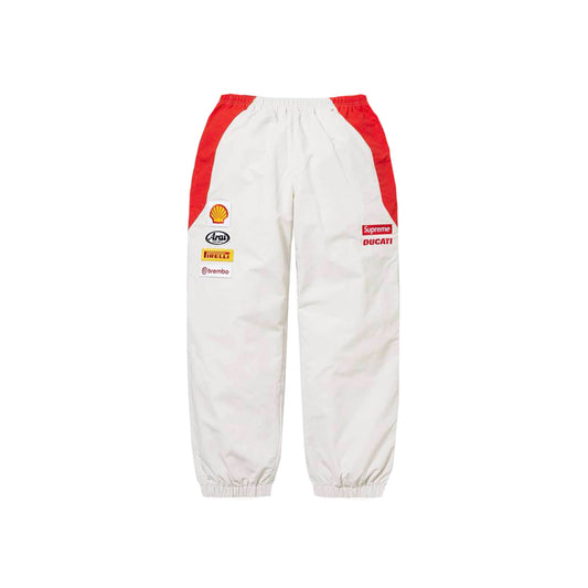 this is an image of Supreme Track Pant Ducati Logo