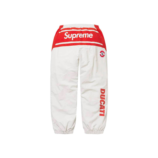 this is an image of Supreme Track Pant Ducati Logo