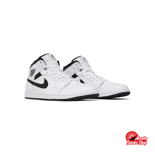 this is an image of Jordan 1 Mid "Reverse Panda" GS