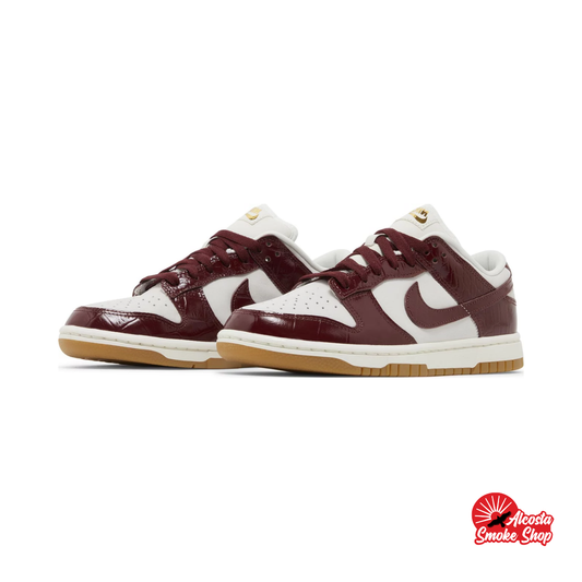 this is an image of Nike Dunk Low LX "Dark Team Red Croc" (Women's)