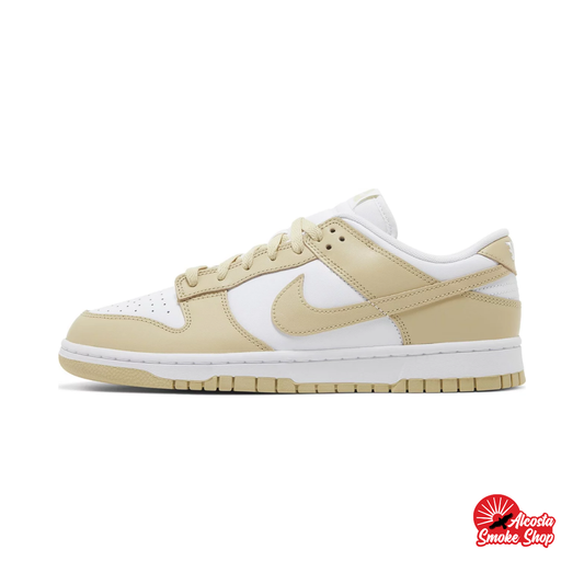 this is an image of Nike Dunk Low Retro BTTYS "Team Gold"