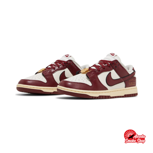 this is an image of Nike Dunk Low SE "Sisterhood Sail Team Red" ( Women's )