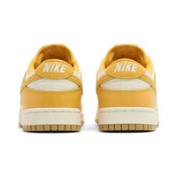 this is an image of Nike Dunk Low "Peach Cream" (Women's)