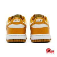 this is an image of Nike Dunk Low "Phantom Gold Suede" (Women's)