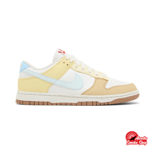 this is an image of Nike Dunk Low "Soft Yellow Alabaster" (Women's)