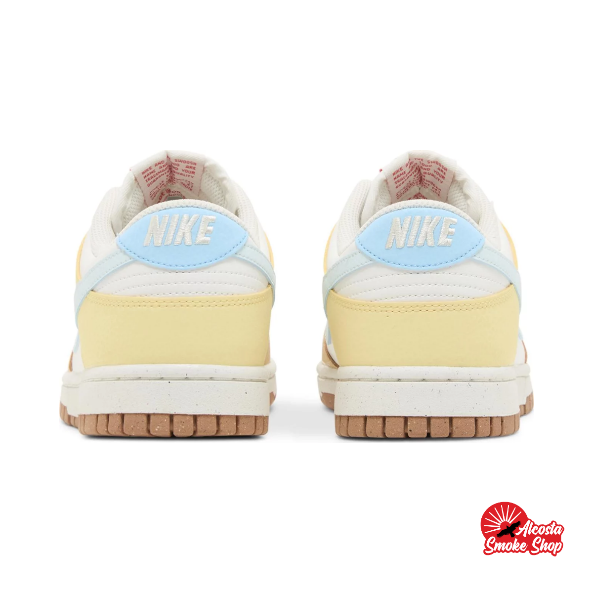 this is an image of Nike Dunk Low "Soft Yellow Alabaster" (Women's)