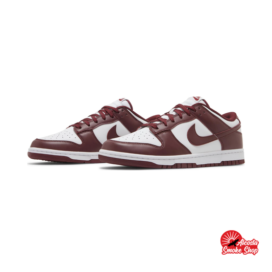 this is an image of Nike Dunk Low "Team Red"
