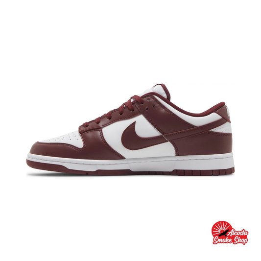 this is an image of Nike Dunk Low "Team Red"